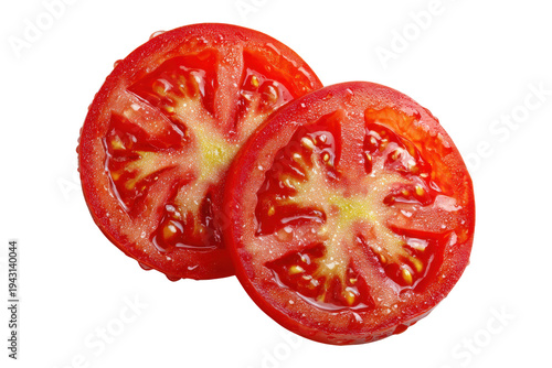 Two sliced red tomatoes isolated on transparent background. Two fresh, ripe, red tomato slices with water droplets isolated on white background.