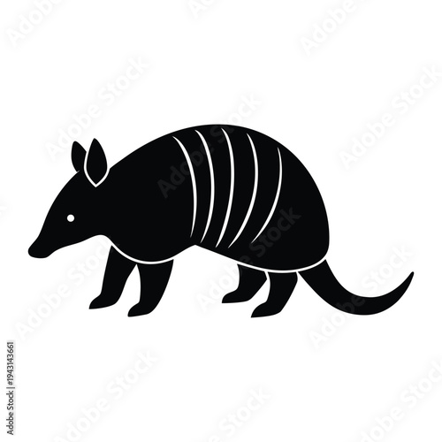 Black silhouette of an armadillo walking