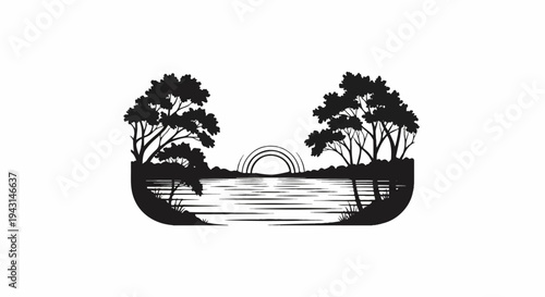 Silhouette of trees and a tranquil lake with a setting sun over the horizon