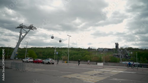 General view of the Moscow travel cable car across the river. Cable car cabins in the city. Funicular. Cableway