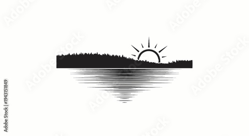 Silhouette of sun rising over forest and rippling water