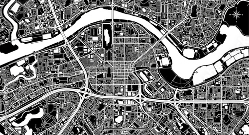Detailed Black and White City Map with River and Urban Layout.