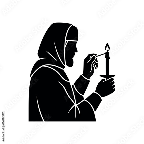 Monk lighting a candle in a solemn religious ceremony.