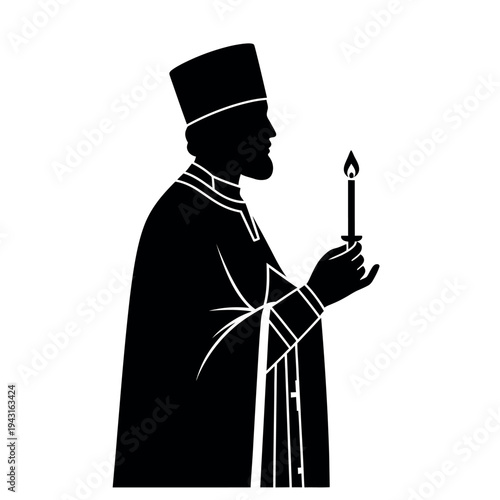 Silhouette of a priest holding a lit candle in a religious ceremony.