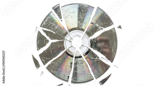 Fotografía Smashed compact disk with cracked holographic surface and broken pieces on a tra