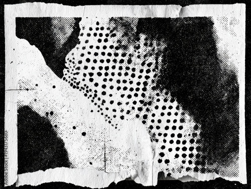 textured torn paper with black and white halftone pattern and visible creases captured from overhead with ample space for text overlay concept of vintage graphic design and print media