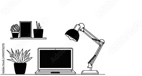 Desk setup with a laptop, lamp, plants, and framed items on a shelf