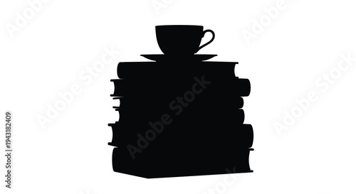 Stacked books with a teacup on top a striking silhouette