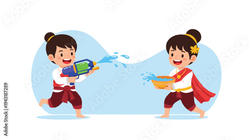 Two joyful Thai children in traditional costumes celebrating Songkran festival by playfully splashing water with a water gun and bowl.