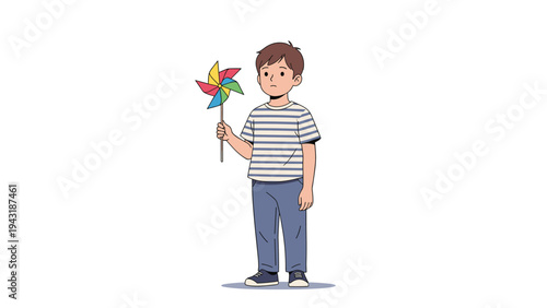 Thoughtful young boy with a striped shirt gently holding a vibrant, colorful pinwheel, observing its movement with curiosity.