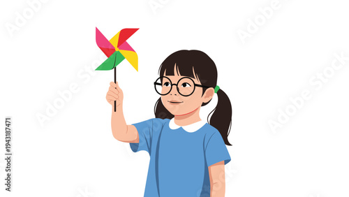 Adorable young girl with glasses and pigtails, happily holding a spinning, colorful pinwheel, enjoying a breezy day.