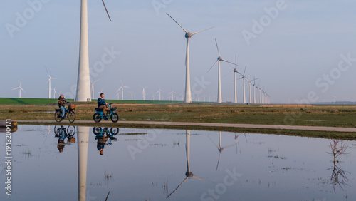 Exploring the scenic wind farms of Urk in Flevoland, Netherlands on a sunny day