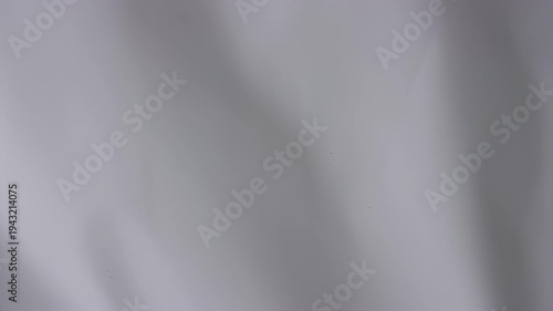 Abstract Soft Fabric Texture Background with Gentle Folds and Shadows.
