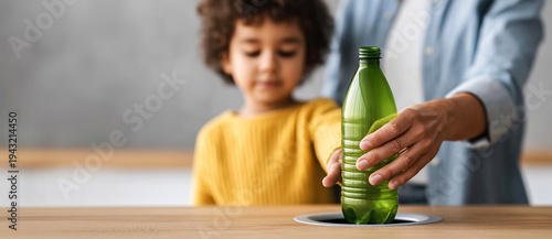 Wallpaper Mural father teaches his son the proper disposal of plastic waste, a concept for separate collection and recycling of trash and waste, copy space for text Torontodigital.ca