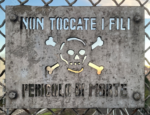 Warning Sign with Skull and Crossbones – Danger of Death (Italian)