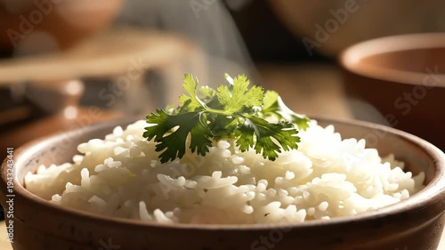 Steaming rice in wooden bowl with garnish overhead shot close up