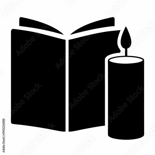 An open book with a candle symbolising knowledge and enlightenment