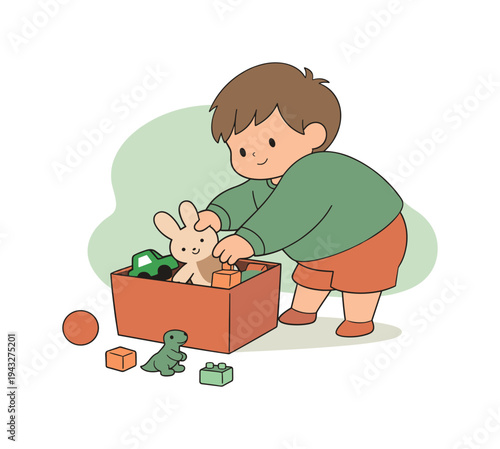 Cute toddler boy happily playing with his toys in a box, learning and developing