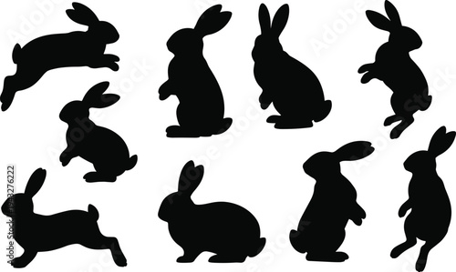 Set of nine black rabbit silhouettes in various jumping and standing poses, ideal for Easter holiday projects, spring nature themes, and cute animal vector graphic designs.