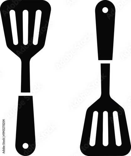 Two black spatula icons on a white background