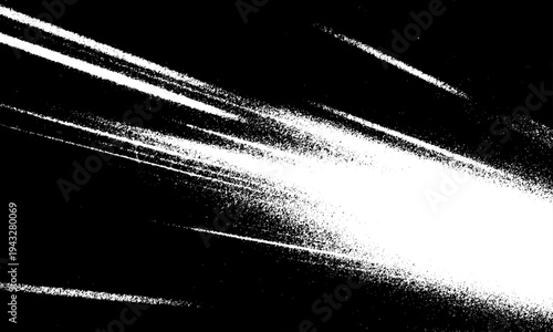Granular white speed streaks and particles flying horizontally on a dark background.
