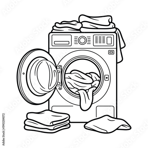 Front loading washing machine with open door filled with clothes and folded laundry nearby