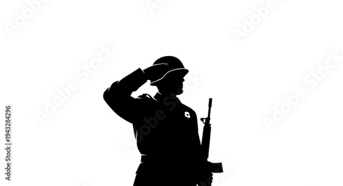 Silhouette of soldier saluting with gun.