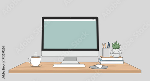 A clean, modern computer workstation with an iMac, coffee, and office supplies is arranged neatly on a light wooden desk against a grey wall.
