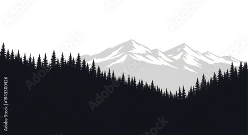 Silhouetted Trees Against Snowy Mountains.