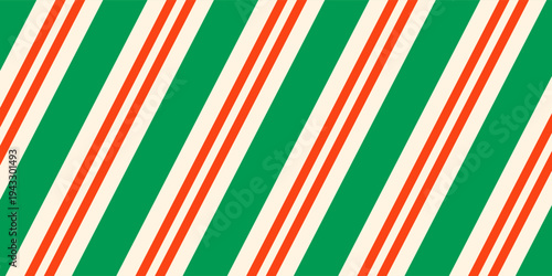 Christmas seamless pattern. Red and green diagonal stripes background. Candy cane repeating decoration wallpaper. Winter holiday lines backdrop. vector