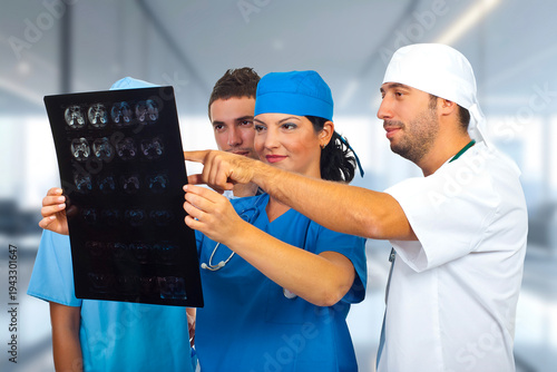 Medical team reviews MRI scans together