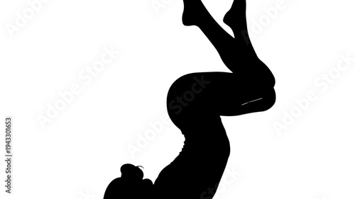 Woman doing yoga headstand with hands supporting body and legs raised high featuring silhouette, black, exercise with fitness and balance elements