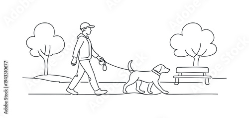 Person walking a medium-sized dog along a sidewalk, leash held loosely in one hand, small waste bag dispenser attached to the