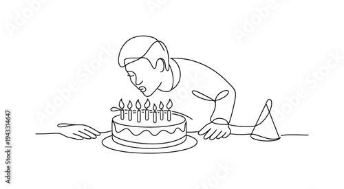 Person leaning forward to blow out candles on a round birthday cake, small flames flickering above the icing, friends’ hands