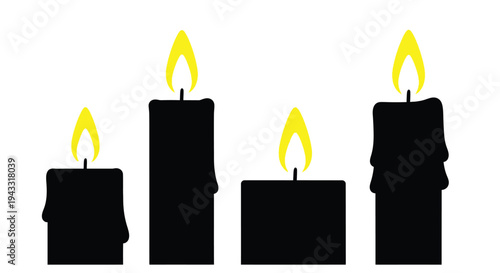 Four black candles with bright yellow flames a striking silhouette