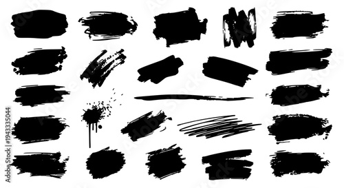 Brushstrokes set with black grunge ink blotches and smears on white background featuring texture, artistic, abstract