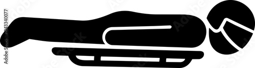 Skeleton pictogram showing person lying on sled sliding headfirst along ice track