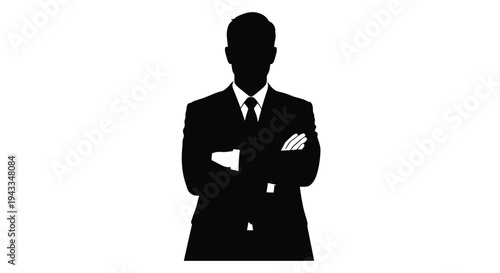 A sharply dressed businessman standing with arms crossed silhouette
