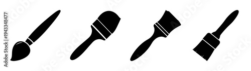 Assorted artist paint brushes and painting knives for canvas art and decorative painting projects