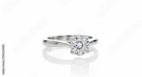 Elegant diamond engagement ring on white background  