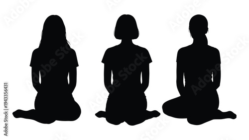 Three women sit in silhouette facing forward in a meditative or contemplative pose