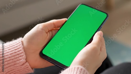 Smartphone with Green Screen Indoor Lifestyle and Mockup Concept in 4K