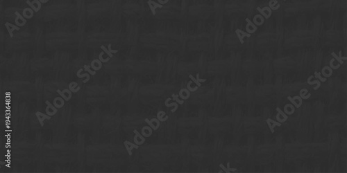 Dark gray woven fabric texture background, seamless charcoal carbon fiber pattern for luxury backdrop