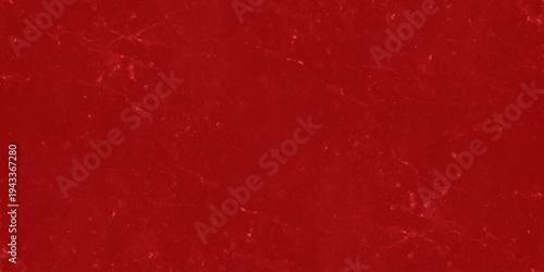 Gritty red textured background with subtle cracks and distressed marble effect for holiday or industrial graphic design