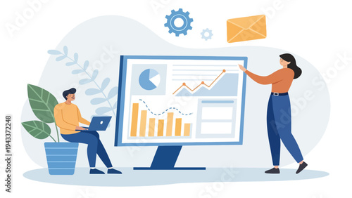 Two colleagues analyzing business data on a large computer screen in a modern office setting