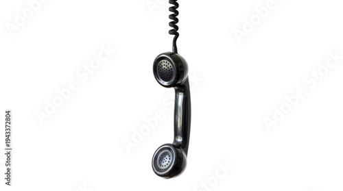 Bild auf Leinwand Vintage black telephone receiver with coiled cord, hanging in mid-air, isolated