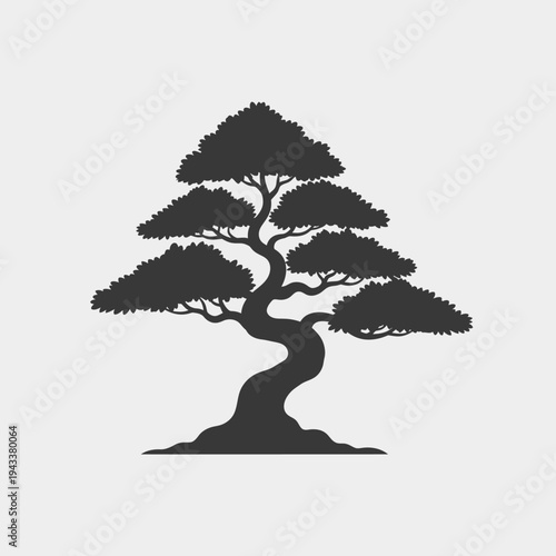 Silhouette of a stylized bonsai tree against a plain background