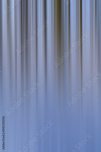 Abstract vertical blurred blue and gray lines gradient background. Digital motion blur texture. Technology and data flow concept. Design for wallpaper, poster, banner, header, template, print. 