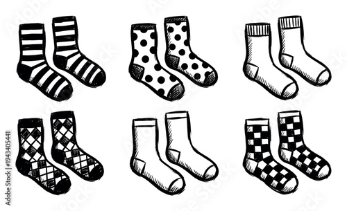 Hand-drawn black and white socks collection featuring six pairs with various graphic patterns like stripes, polka dots, and argyle in a simple doodle sketch illustration