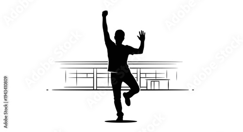 Silhouette of a man celebrating success with one arm raised in front of a modern building.